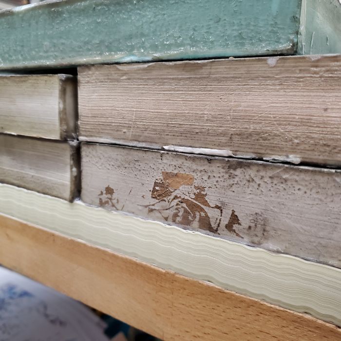 Detail, collage et poids